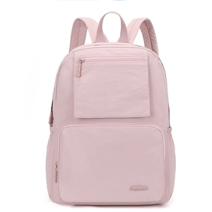 Détail d'un sac à dos en nylon rose clair avec plusieurs poches zippées et tissu résistant