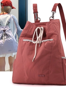 Mochilas elegantes de nailon con cordón en rojo ladrillo y lila para viajes casuales