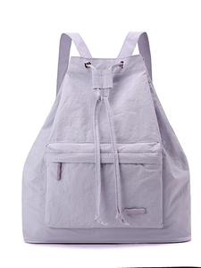 Lightweight lavender drawstring backpack for women with front zipper pocket and nylon finish
