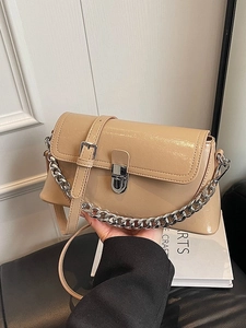 Chic khaki patent leather crossbody bag with silver chain and adjustable shoulder strap