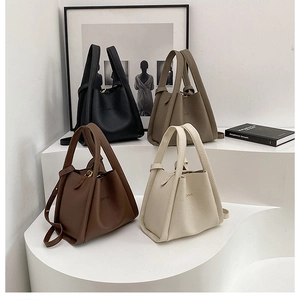 Litchi pattern leather bucket bags in four colors with handles and long shoulder straps