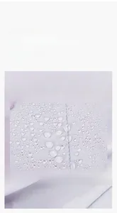 Macro detail of high-density nylon oxford fabric with waterproof water droplets