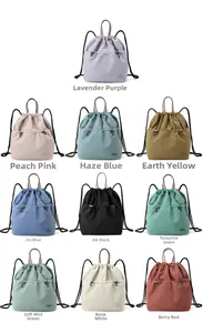 Detailed grid showing ten colorful nylon drawstring backpacks with functional front pockets