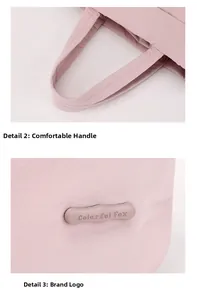 Close-up of the comfortable handle and silicone brand logo on a pink nylon bag