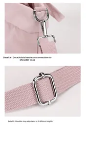 Detail of adjustable nylon shoulder strap with silver metal lobster clasps on pink bag