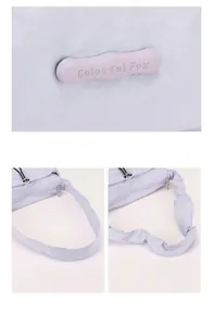 Detailed view of lilac nylon bag showing brand logo and adjustable drawstring shoulder strap