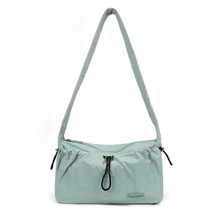 Close-up of water-resistant nylon cloud bag with drawstring detail and zip closure