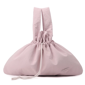 Detailed front view of light pink waterproof nylon tote bag with drawstring closure