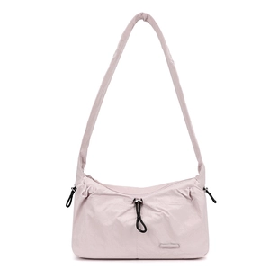 Detailed close-up of light pink nylon cloud bag featuring pleated texture and black drawstring