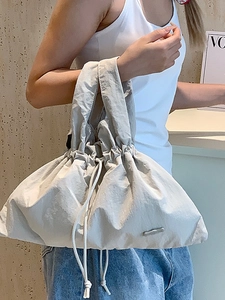 Waterproof nylon drawstring handbag in light gray for winter fashion outdoor casual use