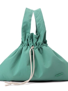 Waterproof mint green nylon drawstring backpack with cotton ropes and rubber logo