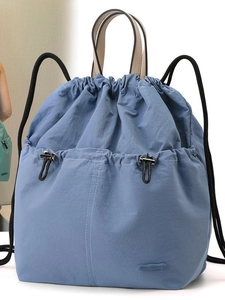 Minimalist fog blue drawstring backpack with beige handle and large capacity