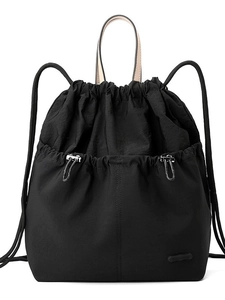 Minimalist black drawstring backpack with large front pockets and lightweight fabric