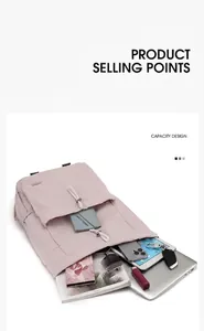 Vue de dessus d'un sac à dos en nylon rose avec ordinateur, livres et objets quotidiens