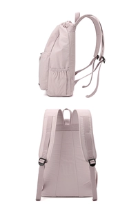 Detail view showing side pocket and adjustable padded straps of the lilac nylon backpack