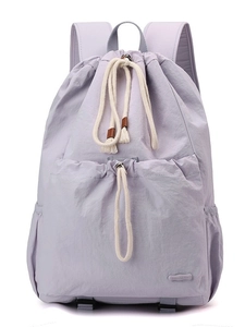 Light purple nylon drawstring backpack with large capacity and white rope accents