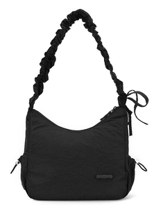 Black nylon crossbody bag featuring ruffled cloud straps and drawstring pleated details