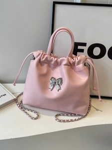 Pink bow-knot pleated tote bag with silver chain strap and drawstring closure