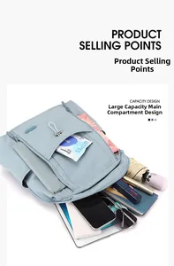 Internal storage layout of light blue nylon backpack showing high capacity for essentials