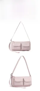 Dual perspective of pale pink nylon shoulder bag with front flap pockets and adjustable strap