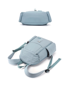 Top and bottom view showing structured nylon travel backpack with waterproof fabric layers