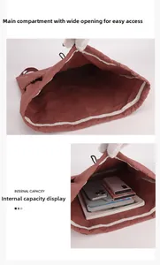 Spacious interior of drawstring backpack showing storage for tablets and gadgets