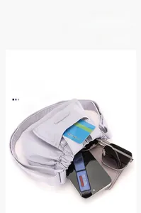 Spacious main compartment of lavender nylon crossbody bag showing daily essentials