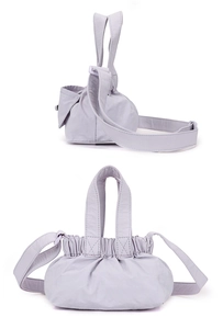 Detail view of light purple pleated crossbody bag showing soft nylon fabric and texture