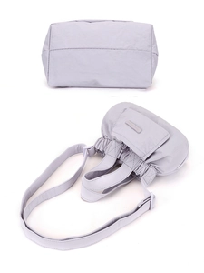 Detailed views of light purple nylon mini bucket bag with pleated texture and front pocket