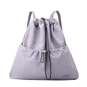 Close-up of waterproof lavender drawstring backpack featuring textured nylon fabric