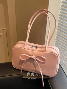 Pink bow shoulder bag with glossy synthetic leather and silver zippers for women