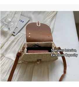 Straw crossbody bag interior showing spacious capacity for cell phone and wallet