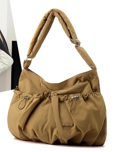 Khaki nylon bucket tote bag with drawstring pockets and adjustable wide strap
