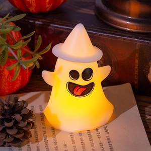 Cozy Halloween ghost night light with wizard hat on vintage books with pumpkins