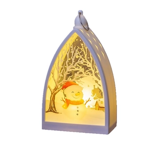 Luminous Christmas lantern with snowman and winter scene in white arched frame