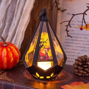 Halloween decorative lantern with witch illustration and warm LED light for table decor