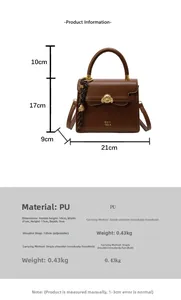 Detail of vintage brown PU leather handbag with golden dog emblem and dimensions