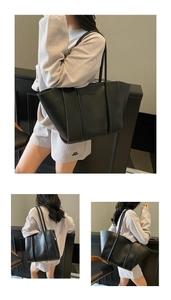 Detail view of black tote bag showing white contrast stitching and the Fashion logo text