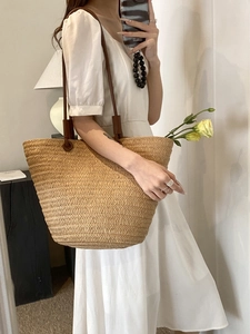 Large capacity woven straw tote bag with brown leather shoulder straps for summer