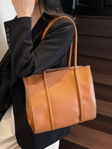 Caramel leather tote bag with FASHION embossing and vintage stitching for women