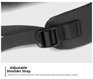 Detail of adjustable shoulder strap with durable buckle and padded fabric on black backpack