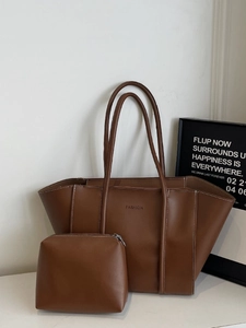 Brown vintage large tote bag with matching pouch and white contrast stitching detail