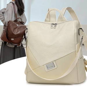 Dettaglio dello zaino vintage in pelle PU con design patchwork e cerniere metalliche