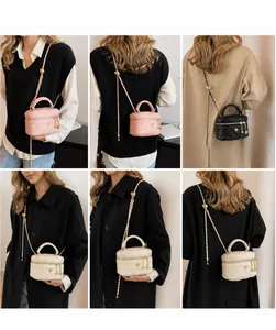 Quilted diamond patterns on miniature crossbody bags with adjustable gold ball chains
