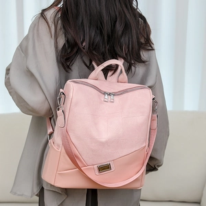 Zaino multifunzione rosa con trama patchwork e dettagli in metallo argentato lucido