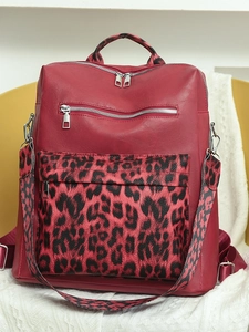 Chic leopard print red backpack for women with adjustable straps and silver zippers