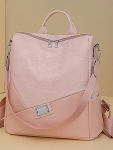 Zaino multifunzionale rosa in ecopelle con design geometrico e dettagli metallici