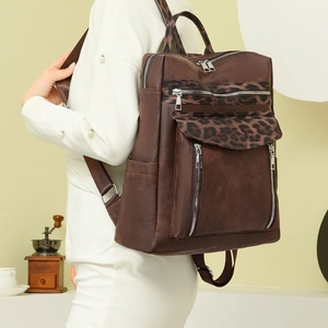 Leopard print backpack for women with side view showing capacity and PU leather texture