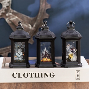 Set of 3 vintage black Halloween lanterns with ghost, castle and witch illustrations