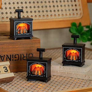 Miniature dollhouse fireplace lantern with flickering warm LED light and vintage black finish